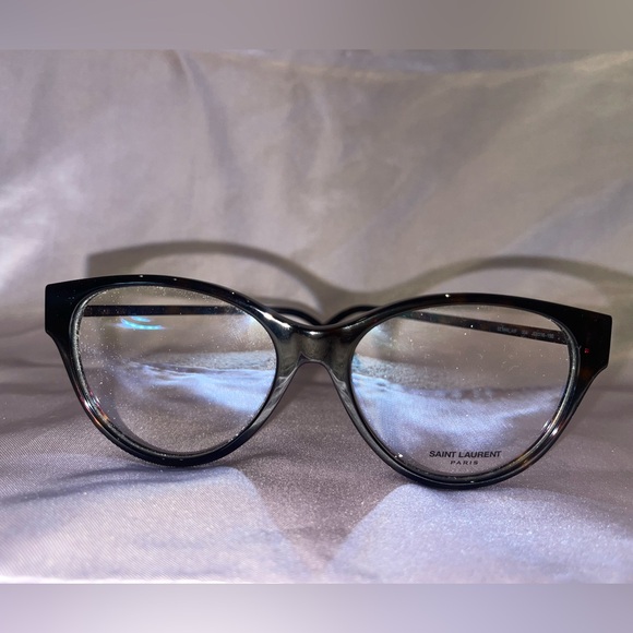 Black and tortoise shell on the sides with a gold YSL detail on both sides. - Picture 2 of 3